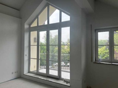 Exclusive 3-Zimmer Dachgeschosswohnung im Ortskern von Ismaning