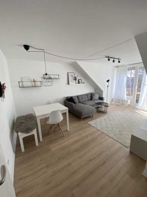2-Zimmer Dachgeschosswohnung mit Balkon in Martinsried (Planegg)