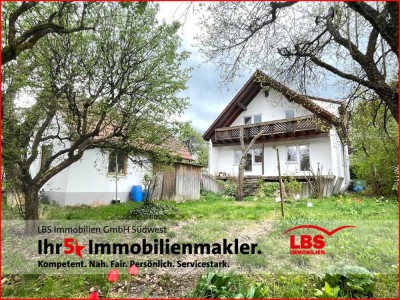 Charmantes Einfamilienhaus mit ELW und Garage