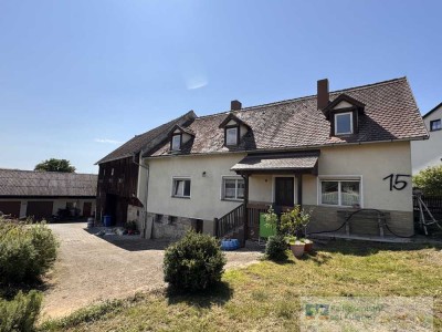 Ehemalige Hofstelle mit viel Platz - Einfamilienhaus mit Scheune und Garagen