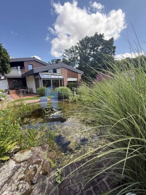 Vielseitiges Ein-Zweifamilienhaus mit Gartenidylle in schöner Lage von Trendelburg