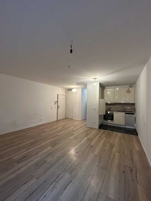 Helle 2-Zimmer Erdgeschosswohnung mit Terrasse und Gartenteil in Düsseldorf-Benrath