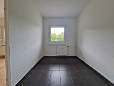 Charmante Erdgeschosswohnung mit Balkon und separater Küche!