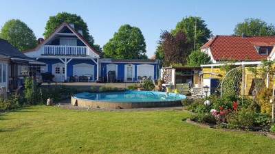 Charmantes Mehrparteienhaus mit vielseitiger Nutzung und idyllischem Garten