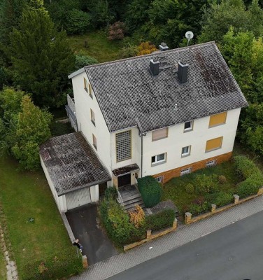 Stark sanierungsbedürftiges Zweifamilienhaus in Waldrandlage von Taunusstein-Bleidenstadt