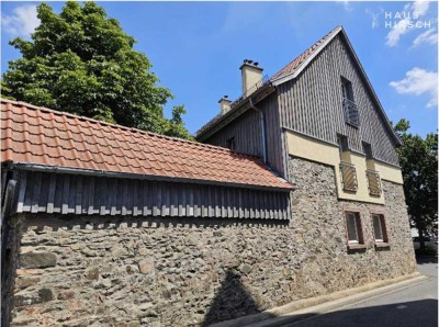 Vielseitiges Wohn- und Geschäftshaus mit 3 modernen Wohnungen und Restaurant