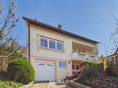 Gartenidylle mit Zukunft – Zweifamilienhaus mit Teich, Potenzial & Herz in Lichtenwald