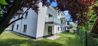 2 Zimmer-Wohnung mit kleinem Garten nach Westen, Stellplatz mit E-Ladestation, Erstbezug