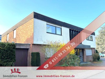 Trier-Tarforst: elegante, frei stehende Villa mit 167 m², Spa-Bereich, großzügigem Garten und zwei G