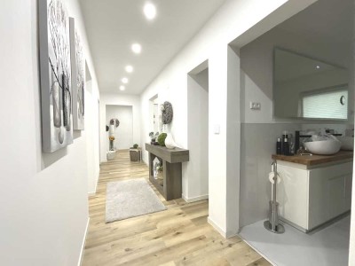 Zweifamilienhaus mit modernem Smarthome-System, Kamin und großzügigem Garten in einer ruhigen Umgebu