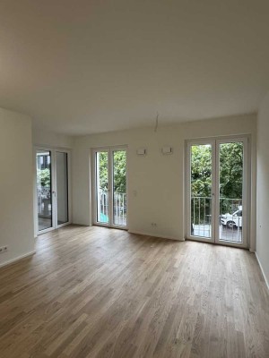 Exklusive teilmöblierte 2-Zimmer Neubauwohnung in Top-Lage - Nur 150m zum Rhein !