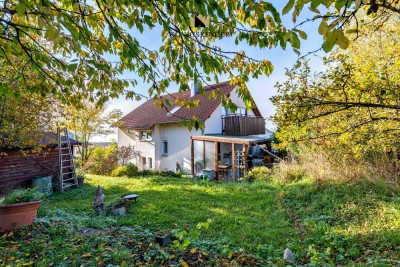 Viel Platz für die Familie – Zweifamilienhaus mit Terrasse, Balkon und teilausgebautem UG
