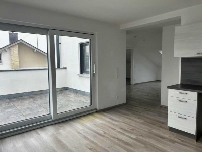 Hochwertige 2 ZKB (W6) mit EBK, Dachterrasse + PKW-Stellpl. in der Duplexgarage! Sofort bezugsfähig!