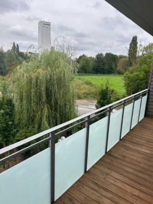 Moderne und exklusive Balkonwohnung mit Top-Ausstattung und Carport - Blick ins Grüne inklusive