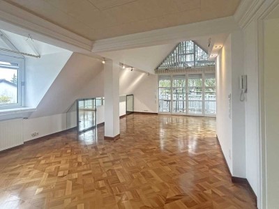 Exklusive 2-Zimmer-Dachgeschosswohnung mit Balkon in Forstenried!