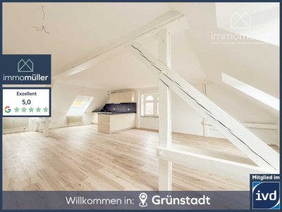 Charmante 2ZKB-Dachgeschosswohnung mit Einbauküche und Gartenmitbenutzung in zentraler Lage!