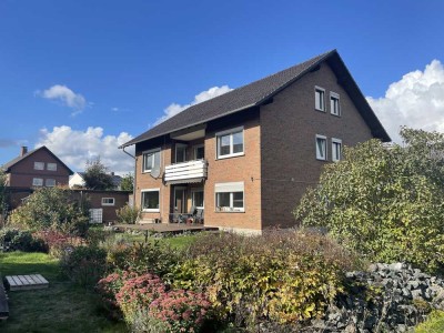 Helle 3-Zimmer-Wohnung mit Balkon, Gartenanteil & Garage in ruhiger Waldrandlage in Möllenbeck
