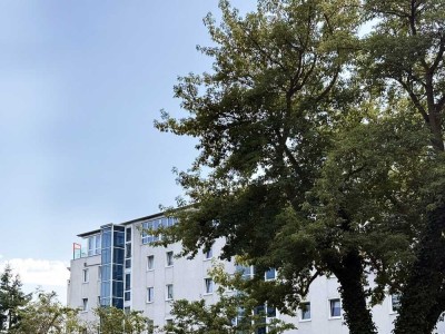 Lichtdurchflutete Dachgeschosswohnung mit großzügiger Dachterrasse