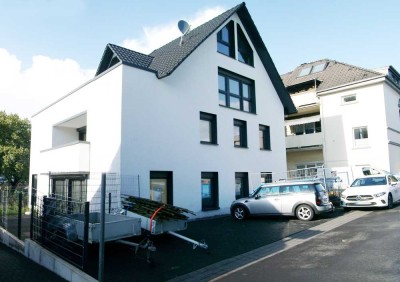 Erstbezug mit Balkon: Stilvolle 4-Zimmer-Erdgeschosswohnung mit geh. Innenausstattung in Solingen