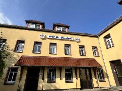 ** Gemütliche 2-Zimmerwohnung mit Balkon, Garagenplatz und großem Garten **