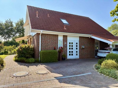 Einfamilienhaus mit Einliegerwohnung - großem Garten und Teich -