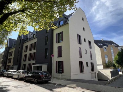Neubau! Erstbezug! Barrierefreie 2 Zi-Gartenwhg. (West-Ausricht) mit EBK, Fußbodenhzg., TG, H-City