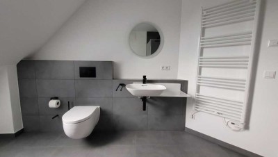 Exklusive 2-Zimmer-Neubauwohnung mit Designbad, großem Balkon und Tiefgaragen Stellplat