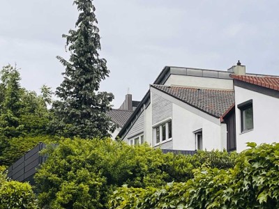 Großzügiges Reihenmittelhaus in zentraler Lage, Split- Level- Architektur