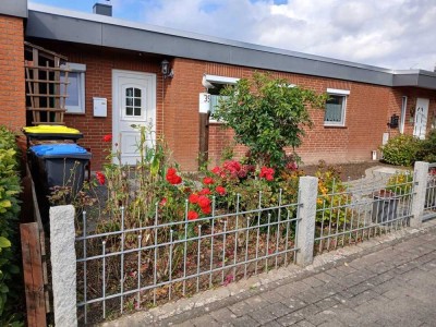 Zwischen Wellen und Wald – Reihenmittelhaus in Strandnähe