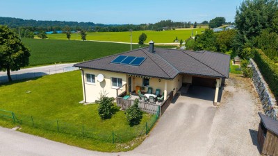 Bungalow mit Einliegerwohnung und großem Grundstück in sonniger Lage!