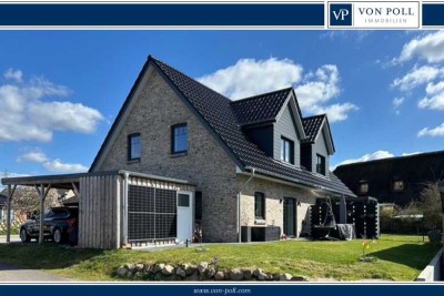 Neuwertige Doppelhaushälfte mit Carport in ruhiger Lage von Schuby