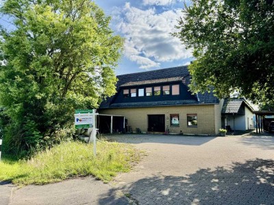 Vermietetes Zweifamilienhaus mit großzügigem Grundstück und Erweiterungsmöglichkeit