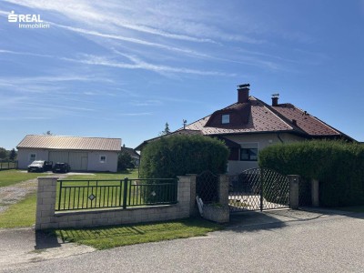 Geräumiges Einfamilienhaus mit großem Grundstück und Mehrzweckhalle in Grafenwörth