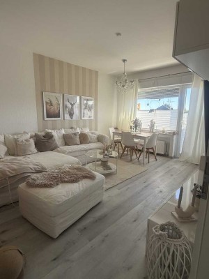 Schöne 3 1/2 Zimmer-Wohnung mit Balkon und Blick ins Grüne – zusätzliche Ausbaufläche im Dachboden