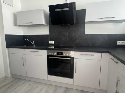 Moderne Maisonette-Dreiraumwohnung mit Balkon und Ausbaupotenzial