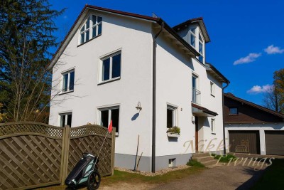 Mehrfamilienhaus mit drei Wohneinheiten in Gräfelfing