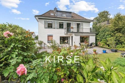 Klassischer Charme trifft Wohnkomfort: Stadtvilla mit Gartenparadies in 1A Lage