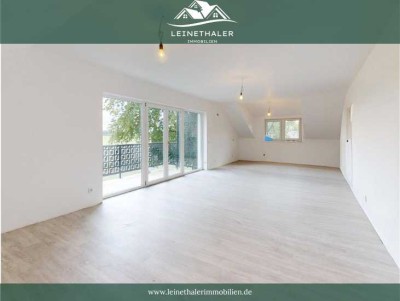 Exklusive Neubau Wohnung in Feldrandlage mit Balkon