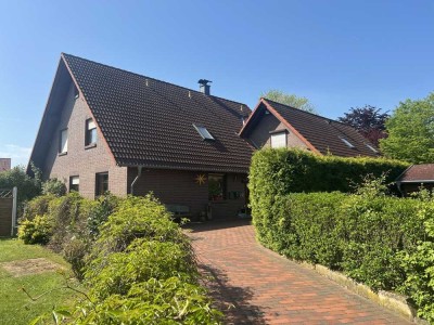 KARSTEN IMMOBILIEN ermöglicht Ihnen: Familienglück im Grünen, traumhaftes ZFH in Auhagen