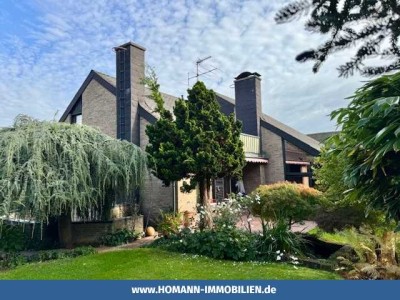 Charmantes EFH in Greven mit besonderer Architektur, Wellnessbereich und wunderschönem Garten!