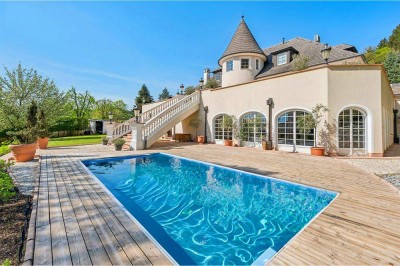 My home is my ... Residieren mit Out- und Indoor Pool