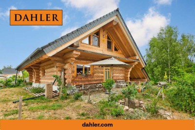 Ökologisches Blockhaus von Architekt Charlie Manz – Charakter & Nachhaltigkeit in Zeschdorf