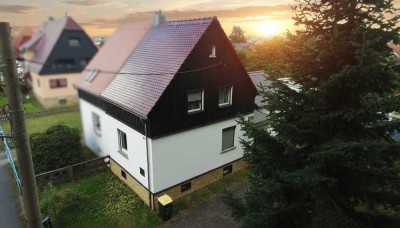 Großzügige Doppelhaushälfte mit Wintergarten, Kamin und Doppelgarage