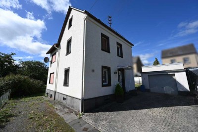 Charmantes Einfamilienhaus mit idyllischem Garten! Ruhige Lage im Herzen von Ettringen!