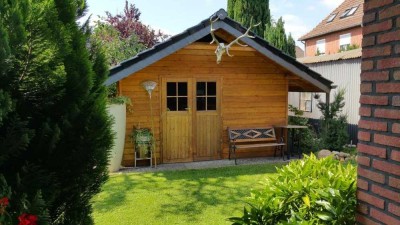 Großzügige Erdgeschosswohnung mit Terrasse und Gartenanteil