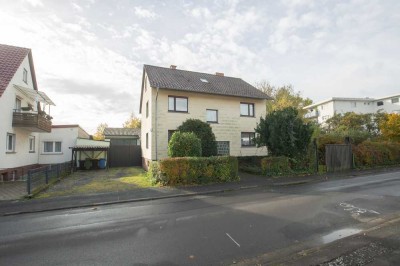 Einfamilienhaus mit Werkstatt und großen Garten