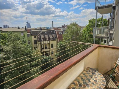 Altbauwohnung mit Blick über die Dächer der Seestadt