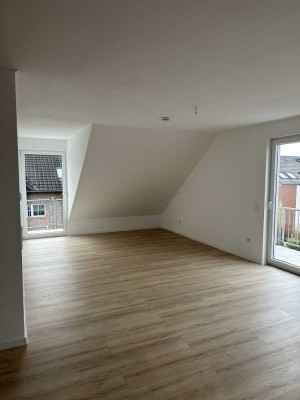 Stilvolle, geräumige und sanierte 2-Zimmer-Wohnung mit Balkon und Einbauküche in Kaarst