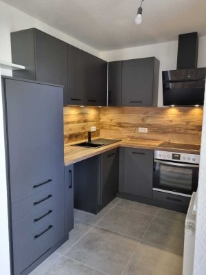 Erstbezug nach Sanierung - Attraktive 2 Zimmer Wohnung inkl. Tiefgaragenstellplatz und Einbauküche