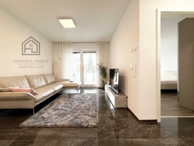 F&D | Neuwertige 2-Zimmer-Wohnung mit Balkon, EBK & TG-Stellplatz